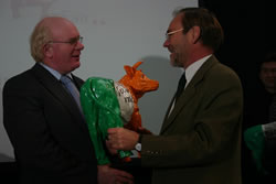 Jackie Cahill, President ICMSA hands over the Irish Faironika
